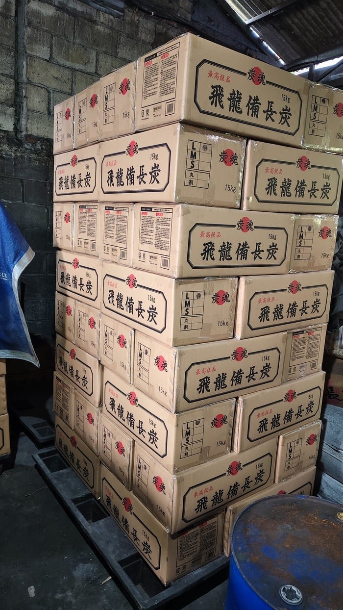 Export cartons of binchotan stacked on a pallet